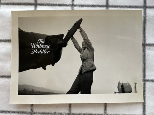 1944 woman hand cranking piper - 1944,